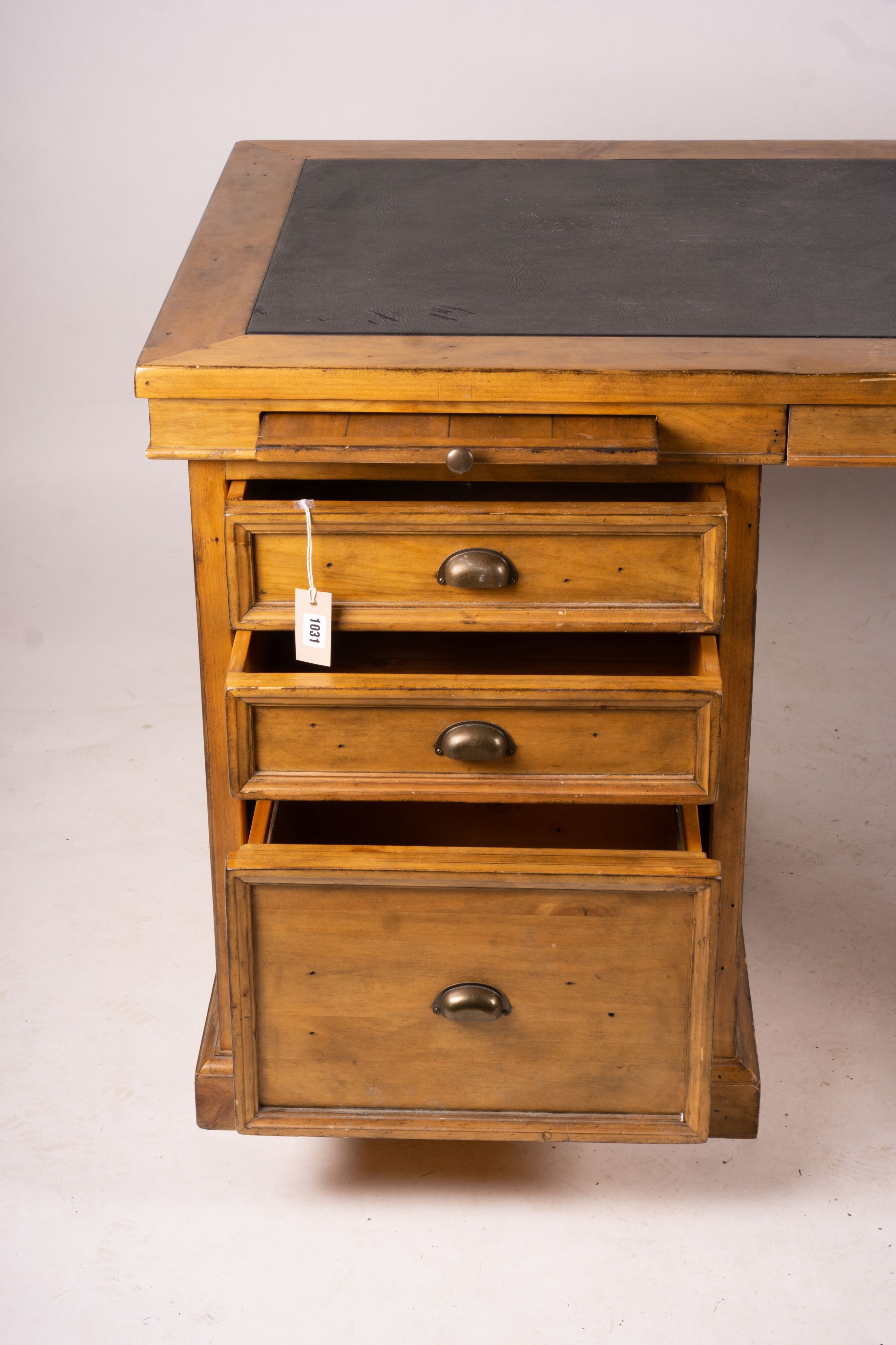 A reproduction pine kneehole desk, width 174cm, depth 79cm, height 86cm together with a matching pine three drawer filing cabinet